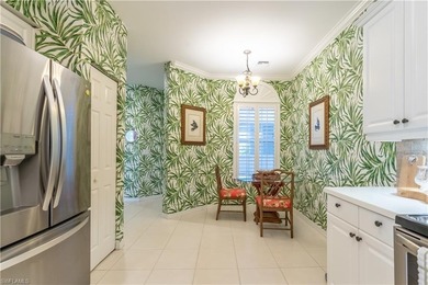 Tucked away in the heart of Pelican Marsh, this beautifully on  in Florida - for sale on GolfHomes.com, golf home, golf lot