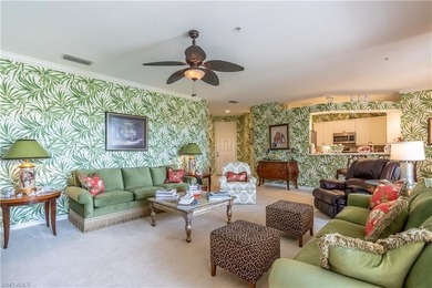Tucked away in the heart of Pelican Marsh, this beautifully on  in Florida - for sale on GolfHomes.com, golf home, golf lot