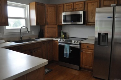 Motivated Seller Priced to move.  Newer roof, outside paint on Copper Ridge Golf Club in Michigan - for sale on GolfHomes.com, golf home, golf lot
