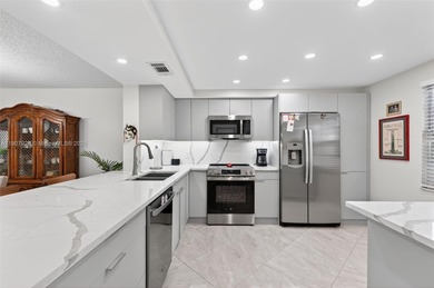 Welcome to your perfect Florida retreat! This beautifully on Wynmoor Golf Course in Florida - for sale on GolfHomes.com, golf home, golf lot