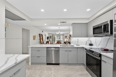 Welcome to your perfect Florida retreat! This beautifully on Wynmoor Golf Course in Florida - for sale on GolfHomes.com, golf home, golf lot