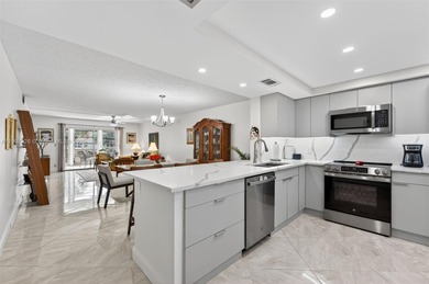 Welcome to your perfect Florida retreat! This beautifully on Wynmoor Golf Course in Florida - for sale on GolfHomes.com, golf home, golf lot