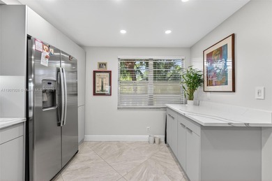 Welcome to your perfect Florida retreat! This beautifully on Wynmoor Golf Course in Florida - for sale on GolfHomes.com, golf home, golf lot