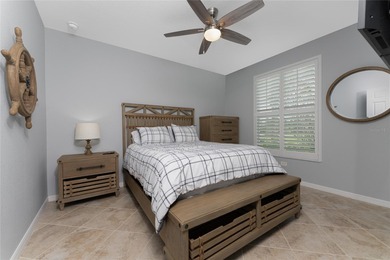 Sweeping golf course AND water views abound from this desirable on Heritage Landing Golf  in Florida - for sale on GolfHomes.com, golf home, golf lot