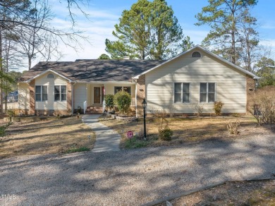 Beautiful 3-bedroom, 2-bath ranch-style home that sits on a on Carolina Trace Country Club in North Carolina - for sale on GolfHomes.com, golf home, golf lot