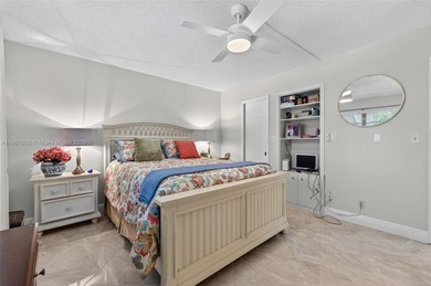 Welcome to your perfect Florida retreat! This beautifully on Wynmoor Golf Course in Florida - for sale on GolfHomes.com, golf home, golf lot