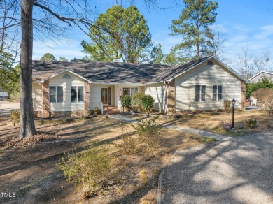 Beautiful 3-bedroom, 2-bath ranch-style home that sits on a on Carolina Trace Country Club in North Carolina - for sale on GolfHomes.com, golf home, golf lot
