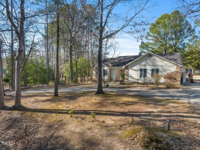 Beautiful 3-bedroom, 2-bath ranch-style home that sits on a on Carolina Trace Country Club in North Carolina - for sale on GolfHomes.com, golf home, golf lot