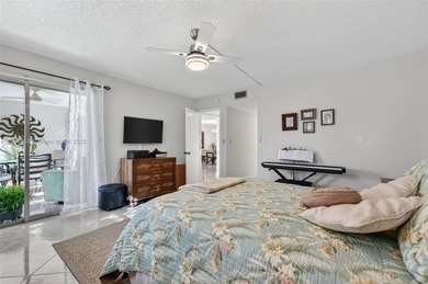 Welcome to your perfect Florida retreat! This beautifully on Wynmoor Golf Course in Florida - for sale on GolfHomes.com, golf home, golf lot