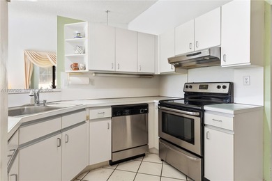 BEAUTIFULLY MAINTAINED ONE-STORY CORNER TOWNHOME OFFERING SERENE on Costa Greens Golf Club in Florida - for sale on GolfHomes.com, golf home, golf lot