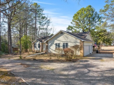 Beautiful 3-bedroom, 2-bath ranch-style home that sits on a on Carolina Trace Country Club in North Carolina - for sale on GolfHomes.com, golf home, golf lot