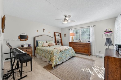 Welcome to your perfect Florida retreat! This beautifully on Wynmoor Golf Course in Florida - for sale on GolfHomes.com, golf home, golf lot