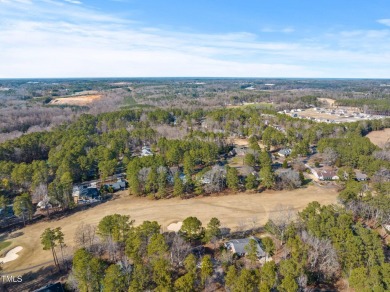 Beautiful 3-bedroom, 2-bath ranch-style home that sits on a on Carolina Trace Country Club in North Carolina - for sale on GolfHomes.com, golf home, golf lot