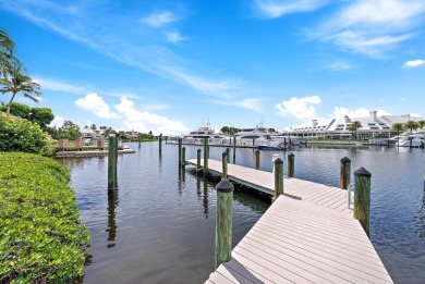 Experience waterfront living at its finest in this rare on Jonathans Landing Golf Club in Florida - for sale on GolfHomes.com, golf home, golf lot
