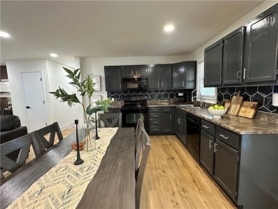 Beautifully updated with an open floor plan, this charming on Royal Meadows Golf Course in Missouri - for sale on GolfHomes.com, golf home, golf lot