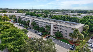 Welcome to your perfect Florida retreat! This beautifully on Wynmoor Golf Course in Florida - for sale on GolfHomes.com, golf home, golf lot