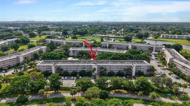 Welcome to your perfect Florida retreat! This beautifully on Wynmoor Golf Course in Florida - for sale on GolfHomes.com, golf home, golf lot