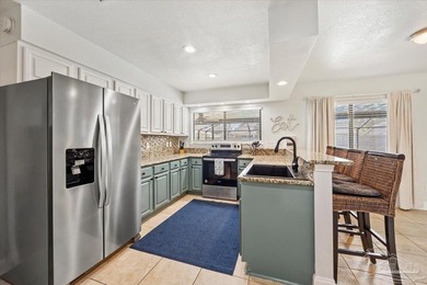 Northwest Florida living at its finest, and this one truly on Perdido Bay Golf Club in Florida - for sale on GolfHomes.com, golf home, golf lot