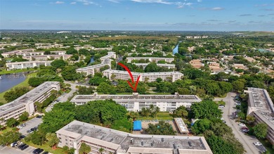 Welcome to your perfect Florida retreat! This beautifully on Wynmoor Golf Course in Florida - for sale on GolfHomes.com, golf home, golf lot