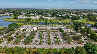 Welcome to your perfect Florida retreat! This beautifully on Wynmoor Golf Course in Florida - for sale on GolfHomes.com, golf home, golf lot
