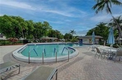 Lowest price 1-bedroom, 1.5-bath unit. Water view. This ground on Wynmoor Golf Course in Florida - for sale on GolfHomes.com, golf home, golf lot