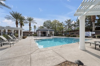 Discover luxury living in this stunning two-story corner unit on TPC at Summerlin in Nevada - for sale on GolfHomes.com, golf home, golf lot