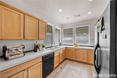 Discover luxury living in this stunning two-story corner unit on TPC at Summerlin in Nevada - for sale on GolfHomes.com, golf home, golf lot
