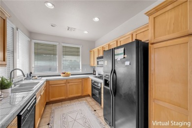 Discover luxury living in this stunning two-story corner unit on TPC at Summerlin in Nevada - for sale on GolfHomes.com, golf home, golf lot