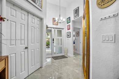 Do not be late! Beautiful completely updated home in prestigious on TPC Eagle Trace in Florida - for sale on GolfHomes.com, golf home, golf lot