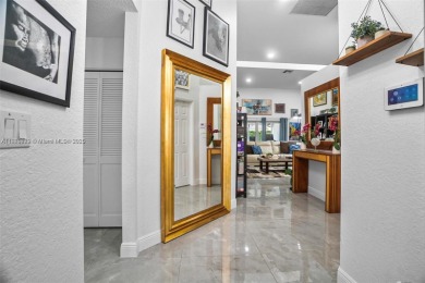Do not be late! Beautiful completely updated home in prestigious on TPC Eagle Trace in Florida - for sale on GolfHomes.com, golf home, golf lot