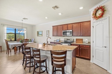 Prepare to be captivated by the elegance and sophistication of on Sarasota National Golf Club in Florida - for sale on GolfHomes.com, golf home, golf lot
