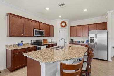 Prepare to be captivated by the elegance and sophistication of on Sarasota National Golf Club in Florida - for sale on GolfHomes.com, golf home, golf lot