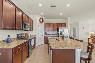 Prepare to be captivated by the elegance and sophistication of on Sarasota National Golf Club in Florida - for sale on GolfHomes.com, golf home, golf lot