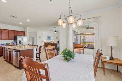 Prepare to be captivated by the elegance and sophistication of on Sarasota National Golf Club in Florida - for sale on GolfHomes.com, golf home, golf lot