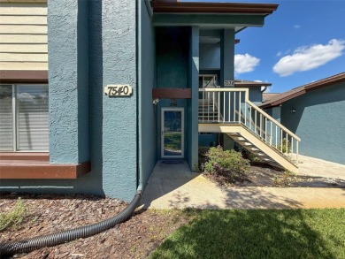 GROUND FLOOR CONDO located on the 8th Fairway of the Heather on Heather Golf and Country Club in Florida - for sale on GolfHomes.com, golf home, golf lot