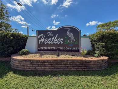 GROUND FLOOR CONDO located on the 8th Fairway of the Heather on Heather Golf and Country Club in Florida - for sale on GolfHomes.com, golf home, golf lot