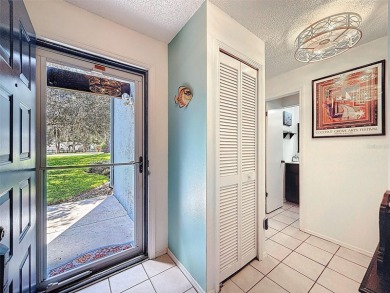 GROUND FLOOR CONDO located on the 8th Fairway of the Heather on Heather Golf and Country Club in Florida - for sale on GolfHomes.com, golf home, golf lot