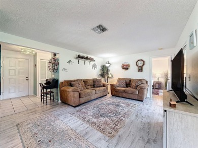 GROUND FLOOR CONDO located on the 8th Fairway of the Heather on Heather Golf and Country Club in Florida - for sale on GolfHomes.com, golf home, golf lot