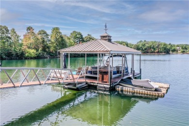 This view of the Blue Ridge Mountains and big, open water with on Keowee Key Golf and Country Club in South Carolina - for sale on GolfHomes.com, golf home, golf lot