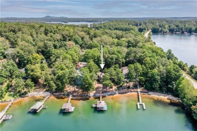 This view of the Blue Ridge Mountains and big, open water with on Keowee Key Golf and Country Club in South Carolina - for sale on GolfHomes.com, golf home, golf lot