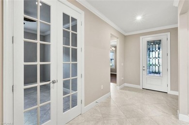 Luxury and Serenity in One of Naples' Most Coveted Communities on Calusa Pines Golf Club in Florida - for sale on GolfHomes.com, golf home, golf lot