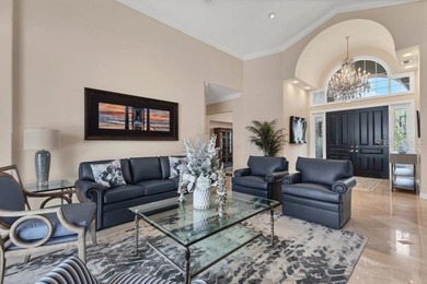 This beautiful custom designed home will captivate you from the on The Oaks Club in Florida - for sale on GolfHomes.com, golf home, golf lot