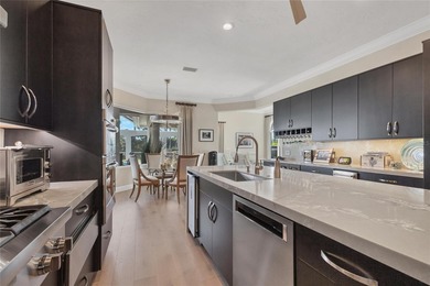 This beautiful custom designed home will captivate you from the on The Oaks Club in Florida - for sale on GolfHomes.com, golf home, golf lot