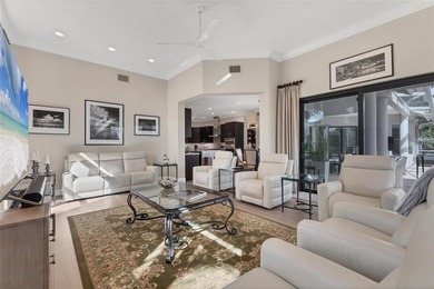 This beautiful custom designed home will captivate you from the on The Oaks Club in Florida - for sale on GolfHomes.com, golf home, golf lot