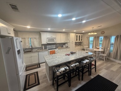 Location! Location! This is a must see home!!   This beautifully on Del Tura Golf and Country Club in Florida - for sale on GolfHomes.com, golf home, golf lot