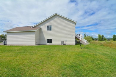 Nestled at the end of a cul-de-sac adjoining a picturesque golf on Stone Creek Golf Course in Minnesota - for sale on GolfHomes.com, golf home, golf lot