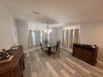 Location! Location! This is a must see home!!   This beautifully on Del Tura Golf and Country Club in Florida - for sale on GolfHomes.com, golf home, golf lot