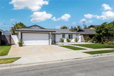 Set in the tranquil Bolsa Chica-Heil neighborhood of Huntington on Meadowlark Golf Club in California - for sale on GolfHomes.com, golf home, golf lot