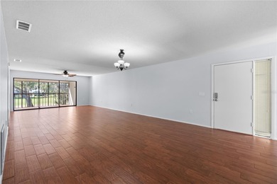 Discover the serenity that lies within the desirable golf on Palm Aire Country Club of Sarasota in Florida - for sale on GolfHomes.com, golf home, golf lot