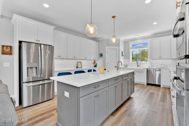 Experience luxury coastal living at its finest on Oak Island's on Founders Club At St. James Plantation in North Carolina - for sale on GolfHomes.com, golf home, golf lot